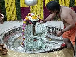 ujjain,Garland of American dollar , Mahakaleshwar Temple
