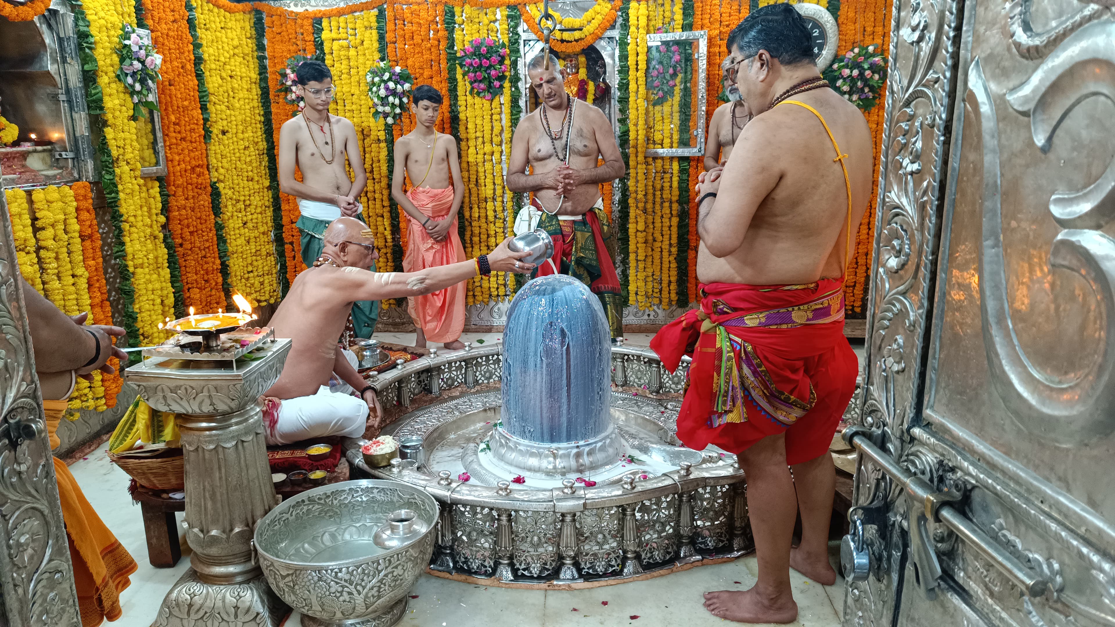 ujjain,   onset of winter, bathing of Lord Mahakal  