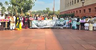 New Dehli , Opposition protests , against pollution , Banners featuring , Modi