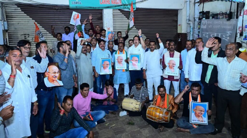 Congress symbolically, protests against, liquor shops, remaining open,Gandhi,death anniversary