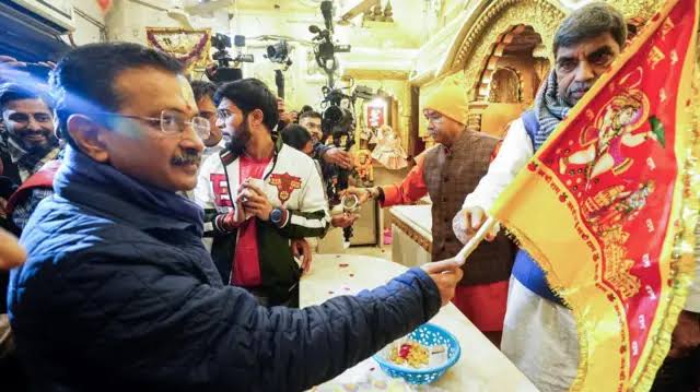 Politics erupts ,Hanuman attire ,  BJP flag; Kejriwal apologizes